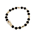 Pulsera Elastica Negra y Dorada con Caballito de Mar con Strass